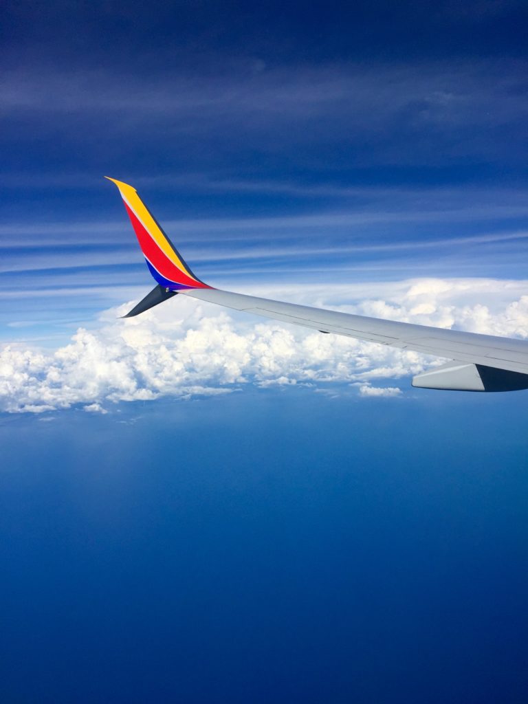 the wing of an airplane in the sky