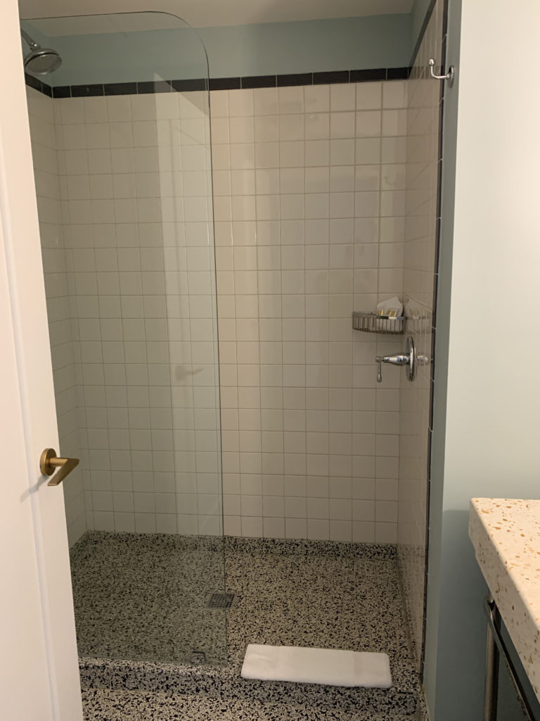 a shower with a glass door