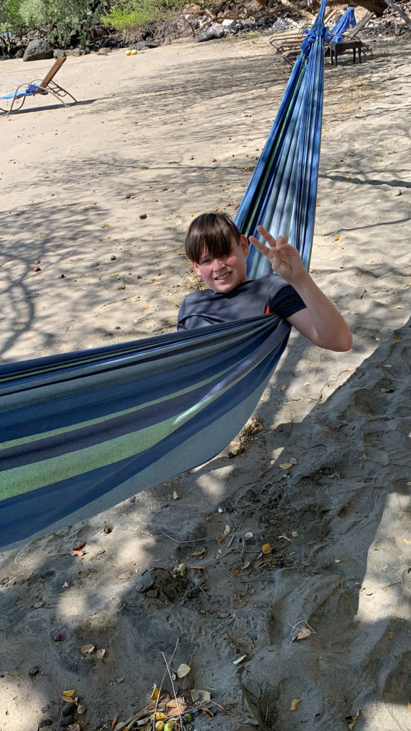 a boy in a hammock