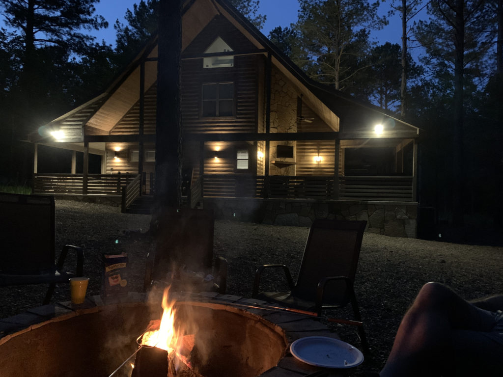 a fire pit in front of a house