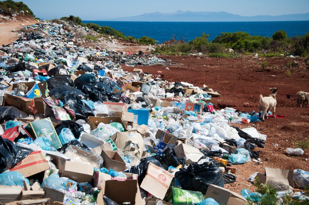 a pile of garbage on a hill