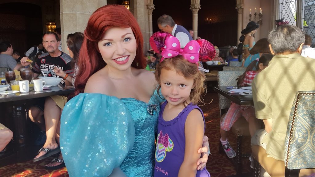 a woman and a child posing for a picture