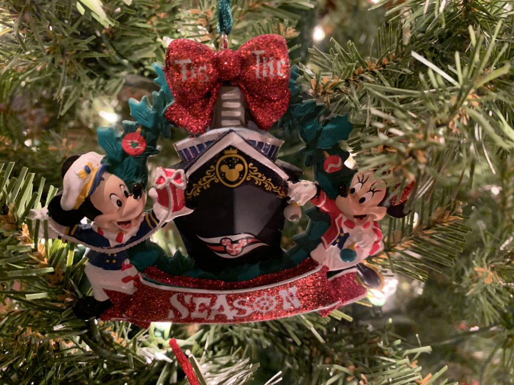 a christmas tree decoration with mickey mouse and minnie mouse