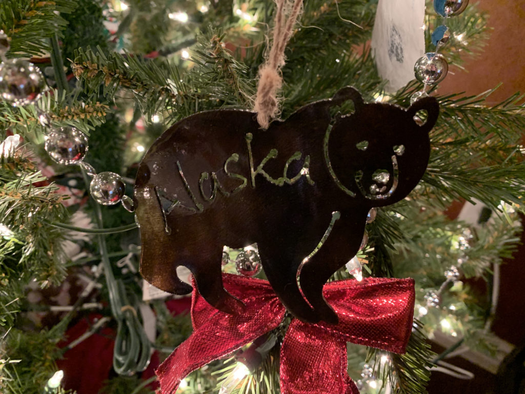 a bear ornament on a tree