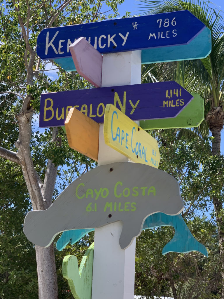 a sign post with different directions