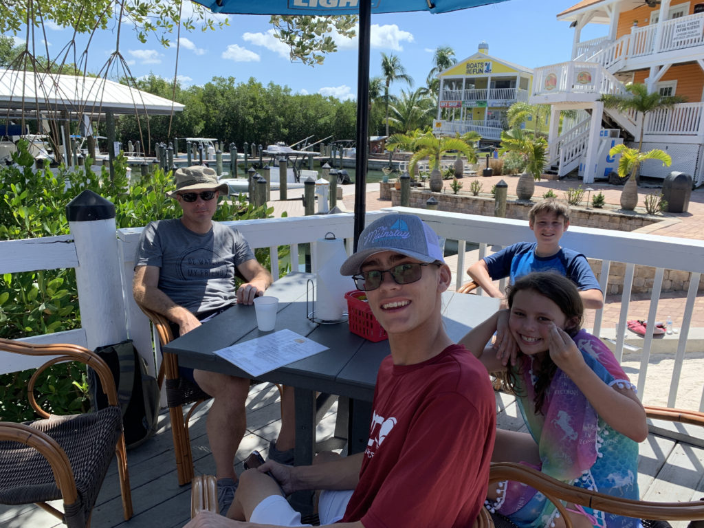 a group of people sitting at a table