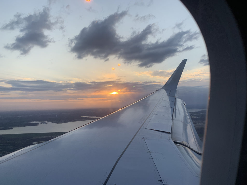 an airplane wing in the sky