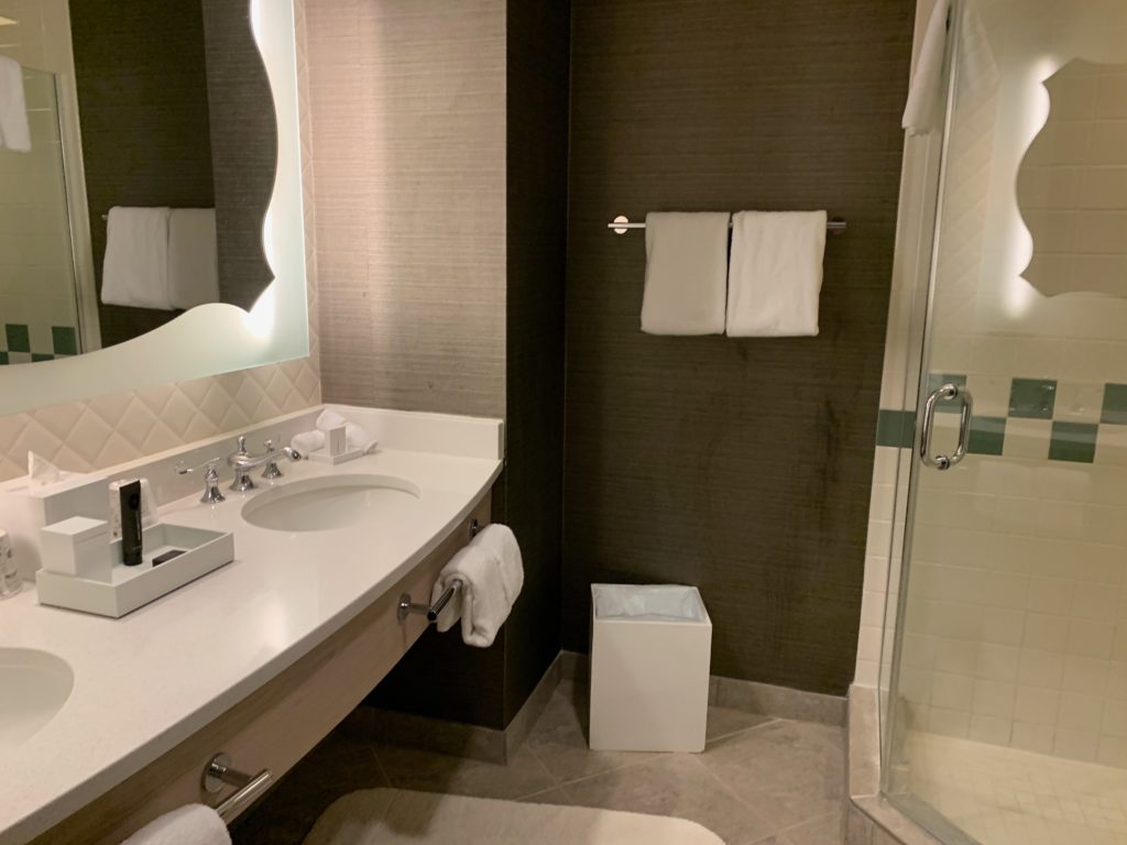 a bathroom with a mirror and sink