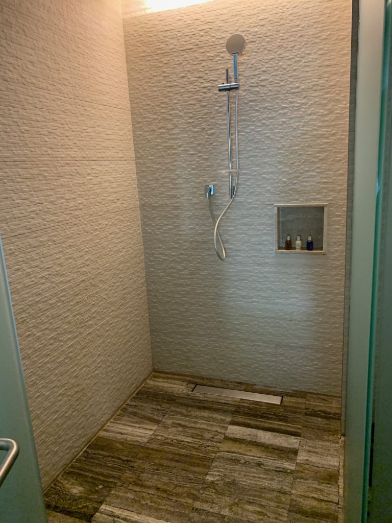 a shower with a shower head
