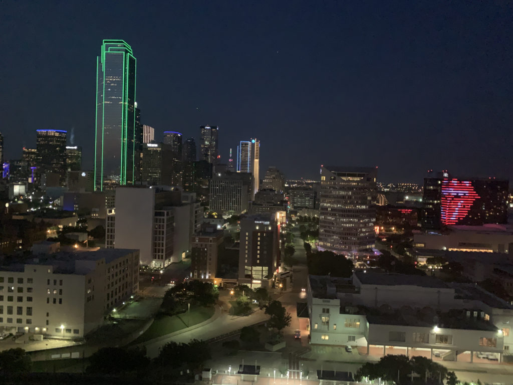 a city at night with many buildings