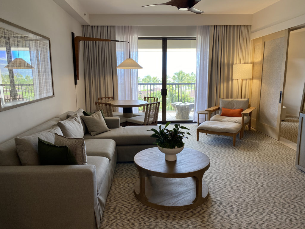 a living room with a couch and a table