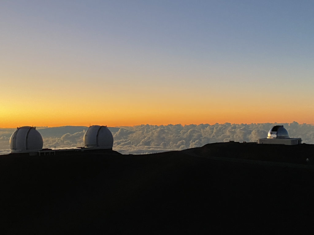 a group of white domes on a mountain