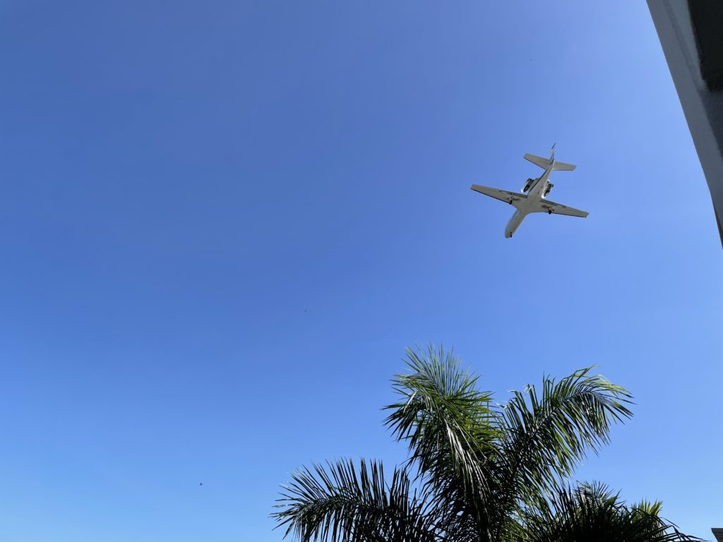 a plane flying in the sky