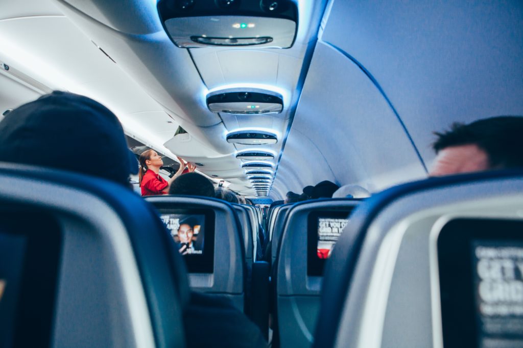 a person standing in an airplane