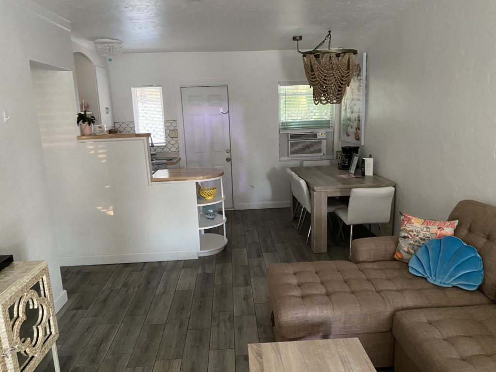 a living room with a couch and a table