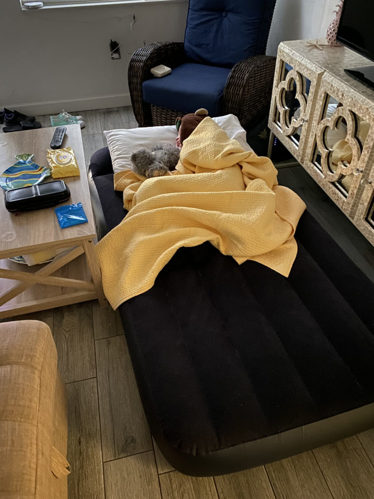 a person sleeping on a bed