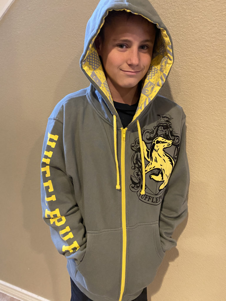 a boy wearing a hoodie