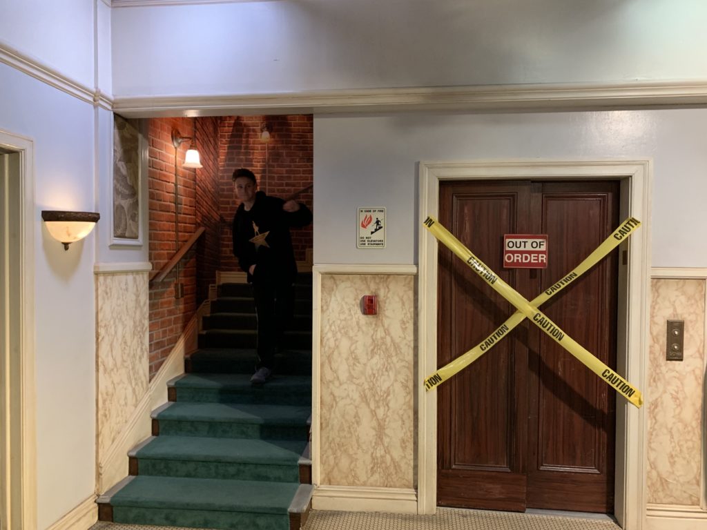 a man standing on stairs in a building