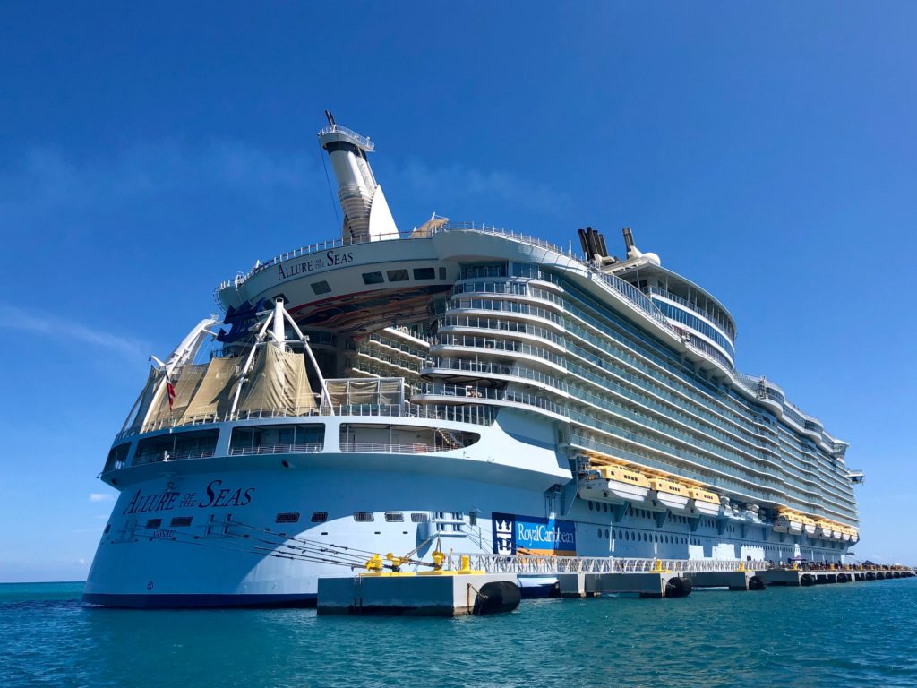 a large cruise ship docked in the water