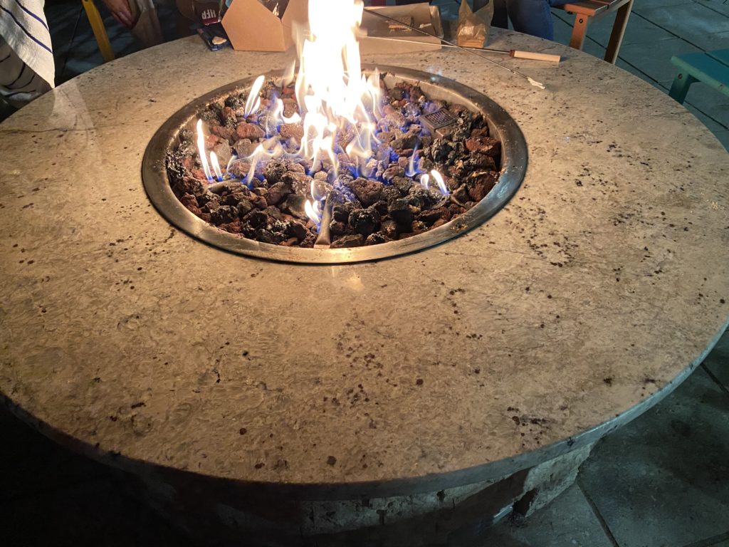 a fire pit with a fire in it