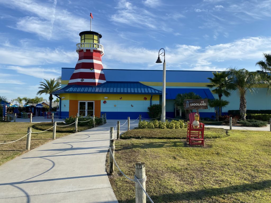 a colorful building with a lighthouse