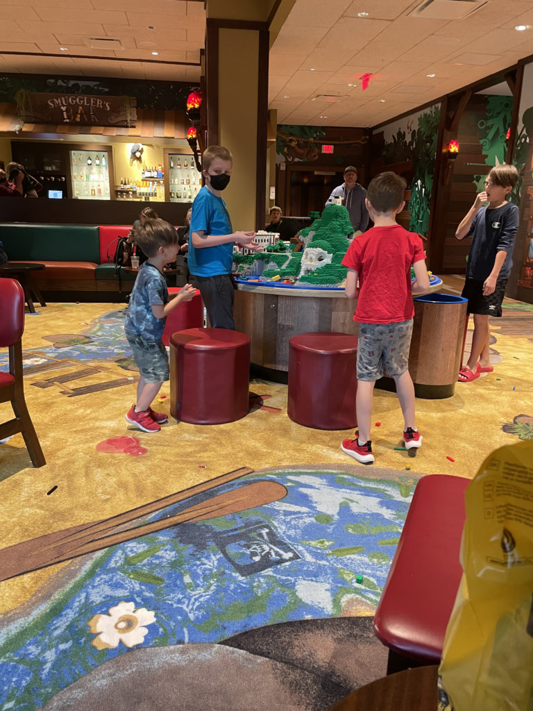 a group of kids playing in a room