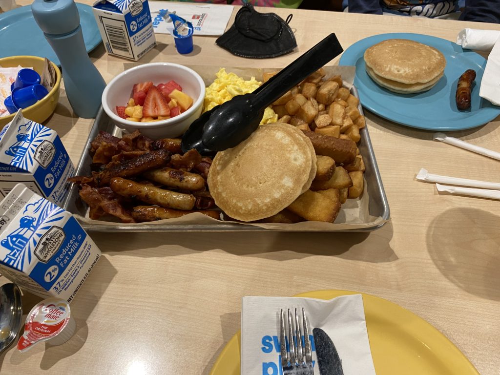 a tray of breakfast food on a table