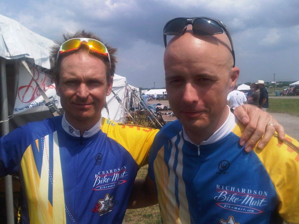 two men wearing cycling jerseys