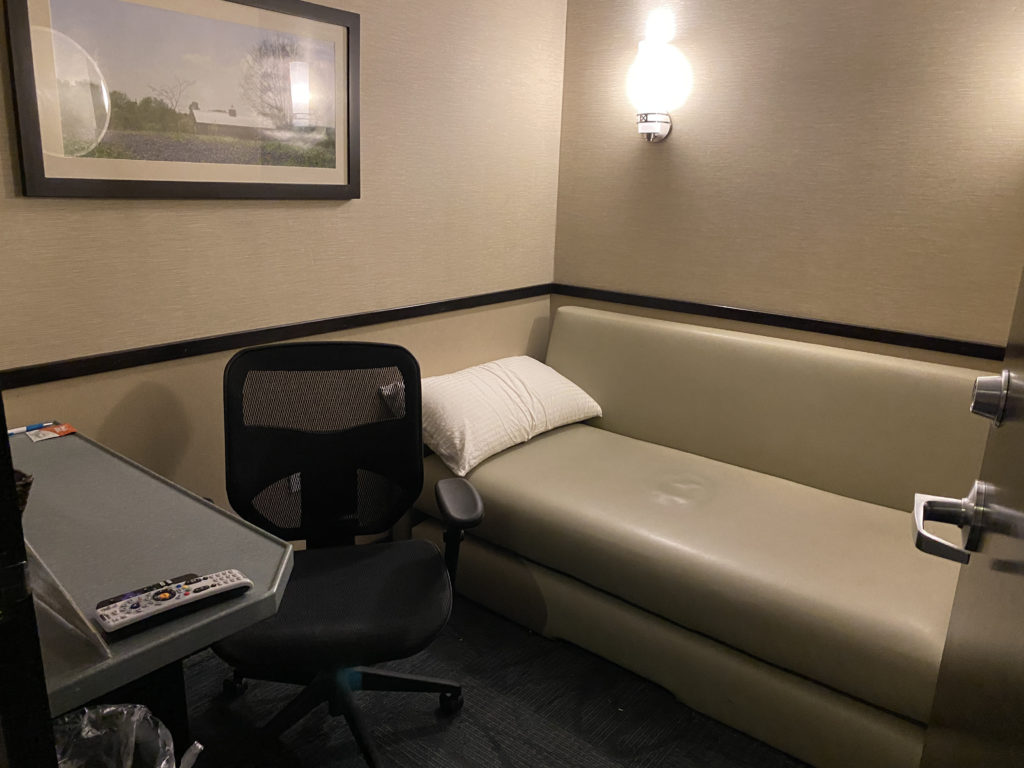 a couch and chair in a room
