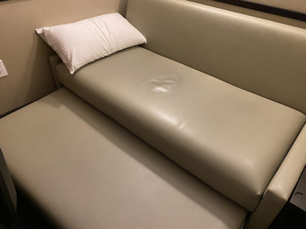 a couch with a pillow on it