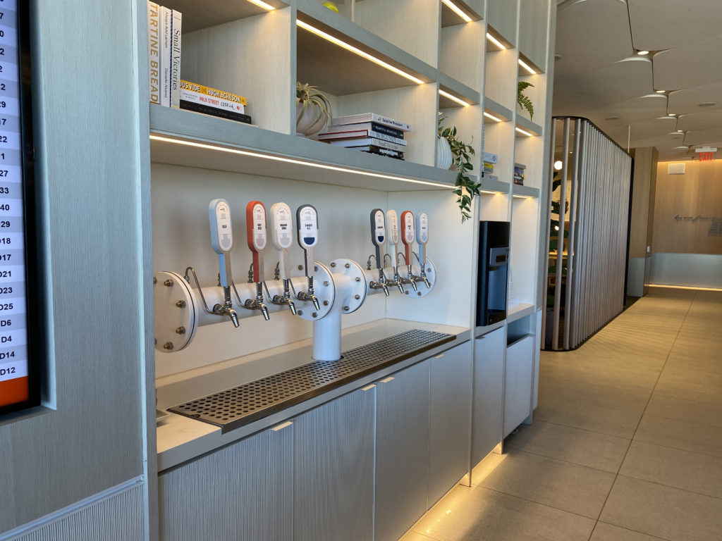 a row of taps on a wall