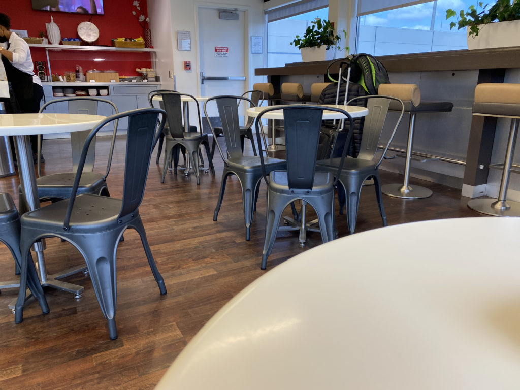 a room with tables and chairs