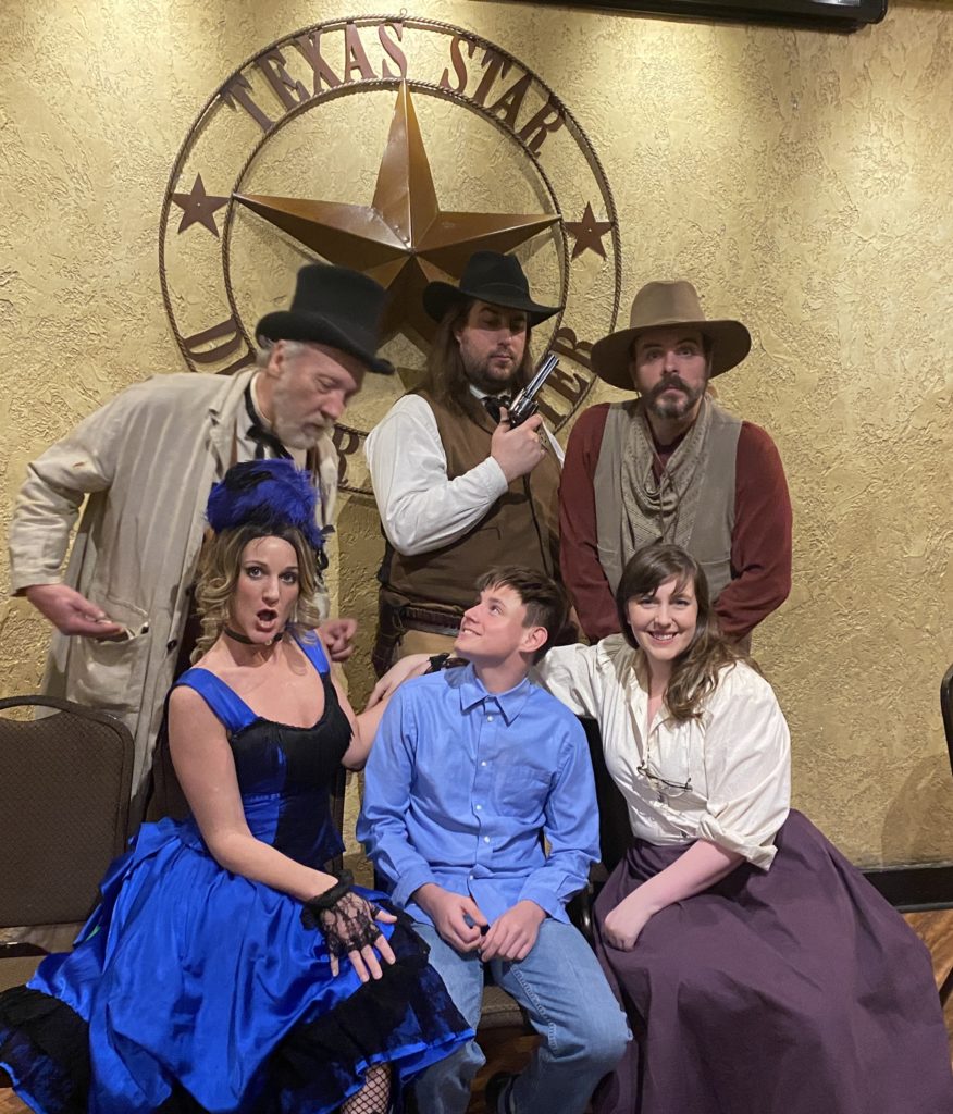 a group of people posing for a photo