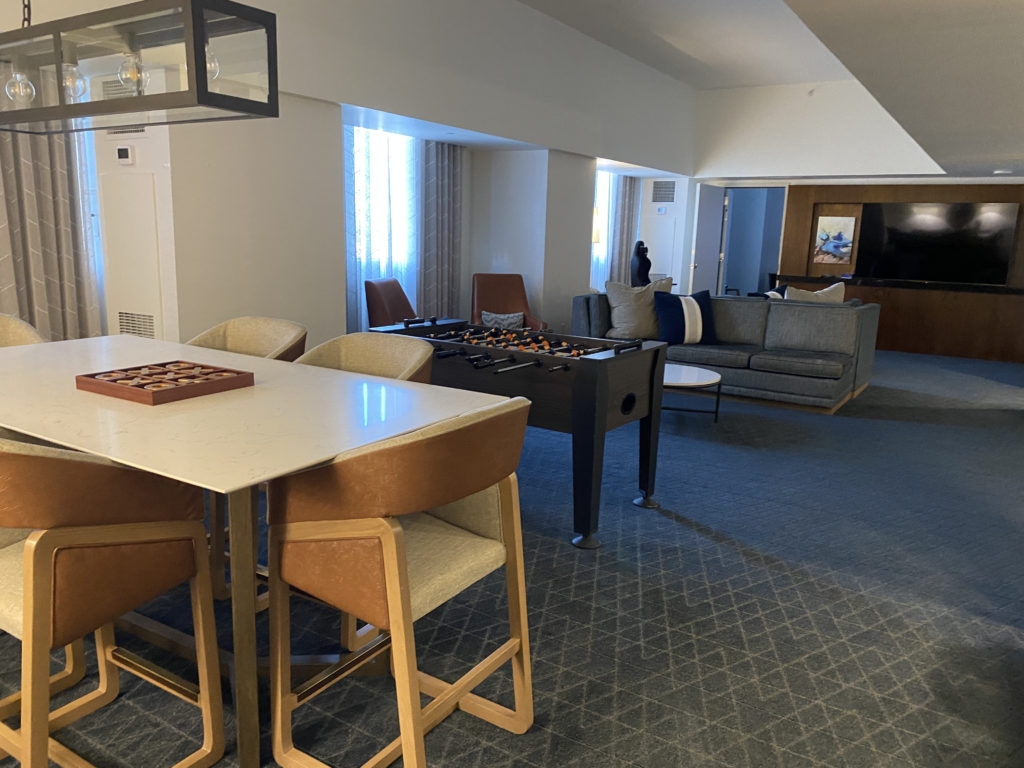 a room with a table and chairs
