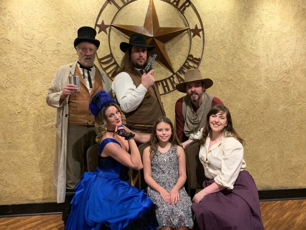 a group of people posing for a photo
