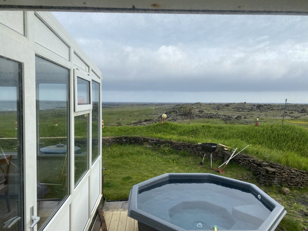 a hot tub outside of a house