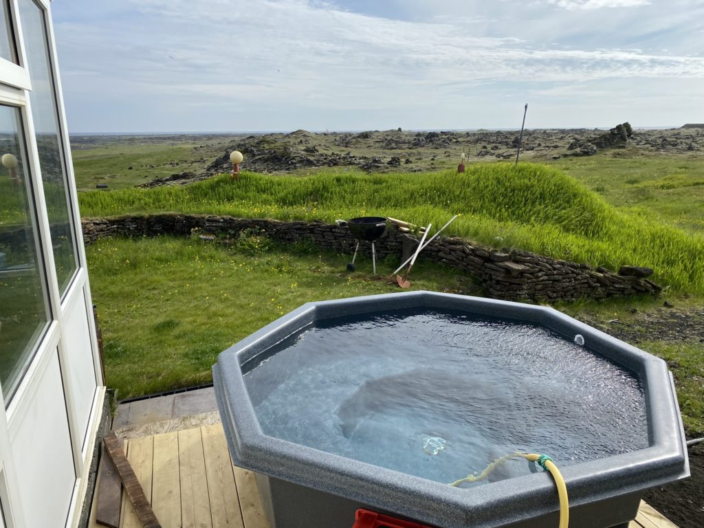 a hot tub in a backyard