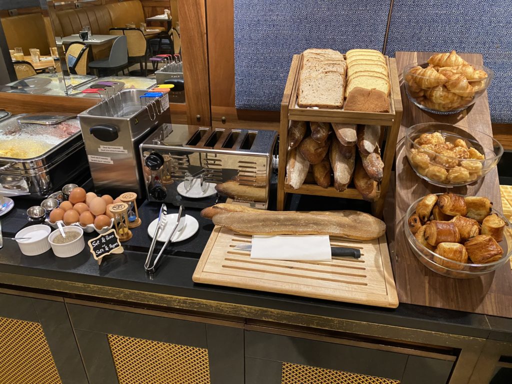 a table with bread and eggs