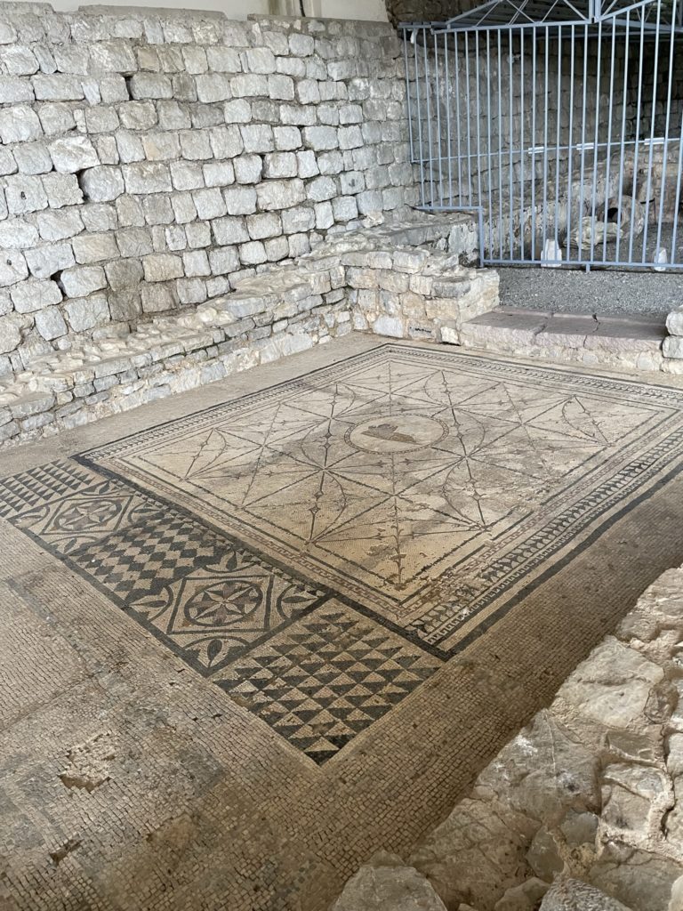 a stone floor with a pattern on it