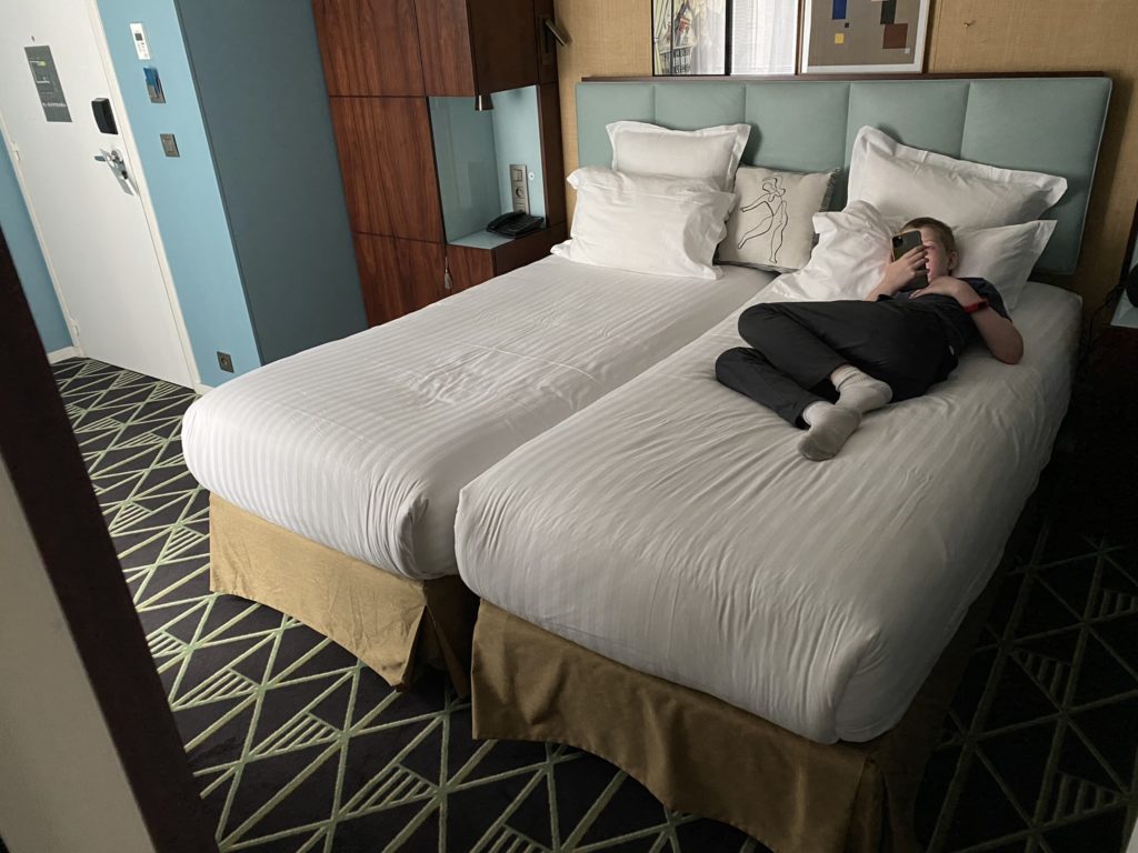 a person lying on a bed