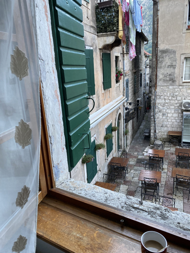 a view of a courtyard from a window
