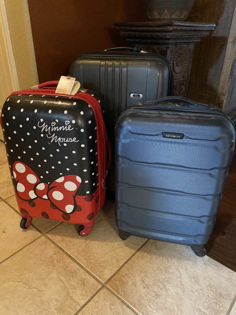 a group of luggage on the floor