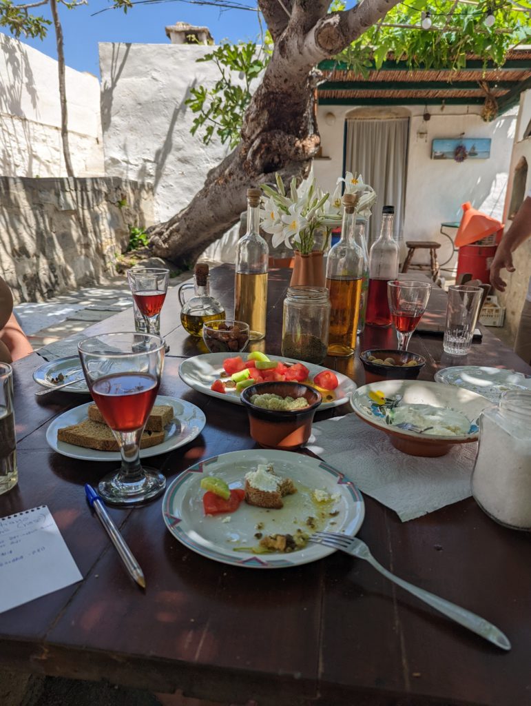 a table with food and wine on it