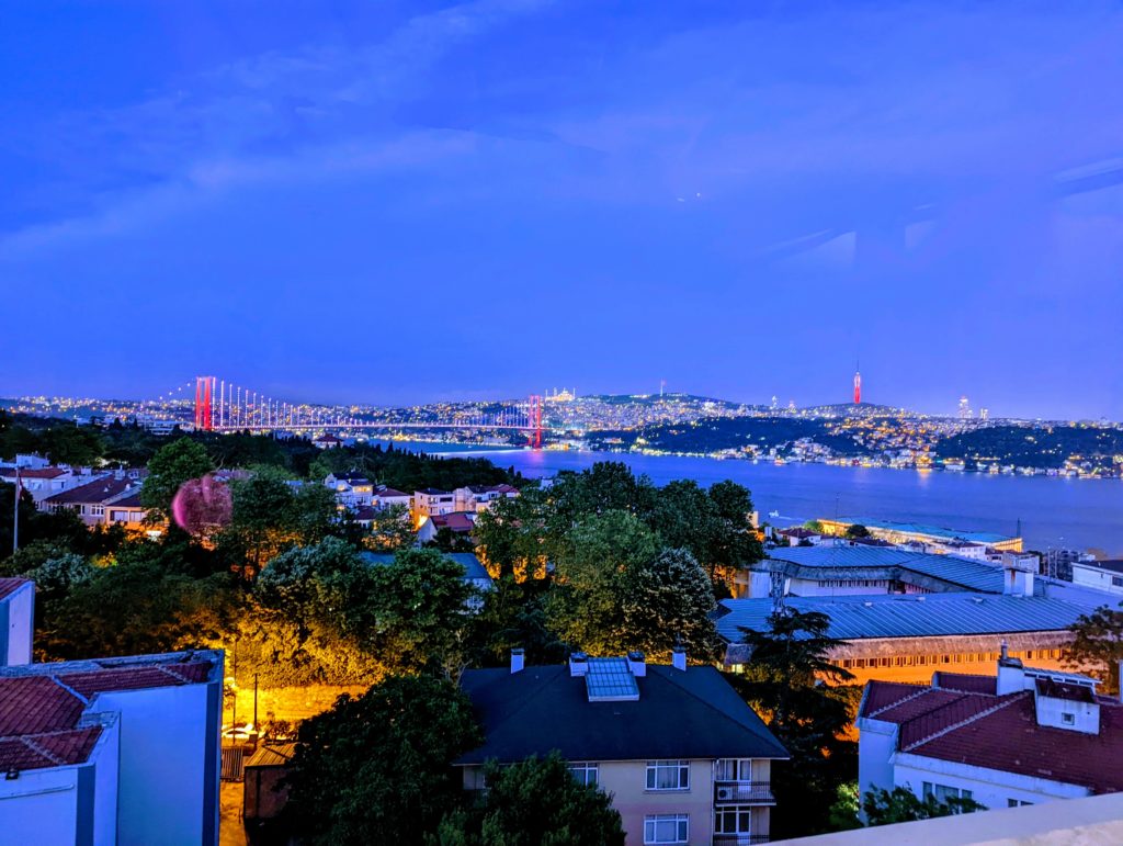a city with a bridge and a body of water