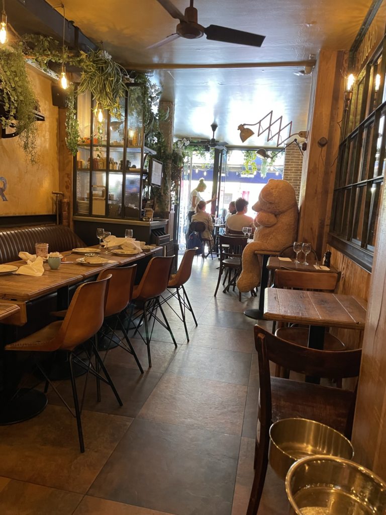 a restaurant with tables and chairs