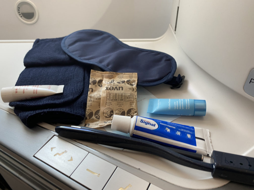 a sleeping bag and other items on a table