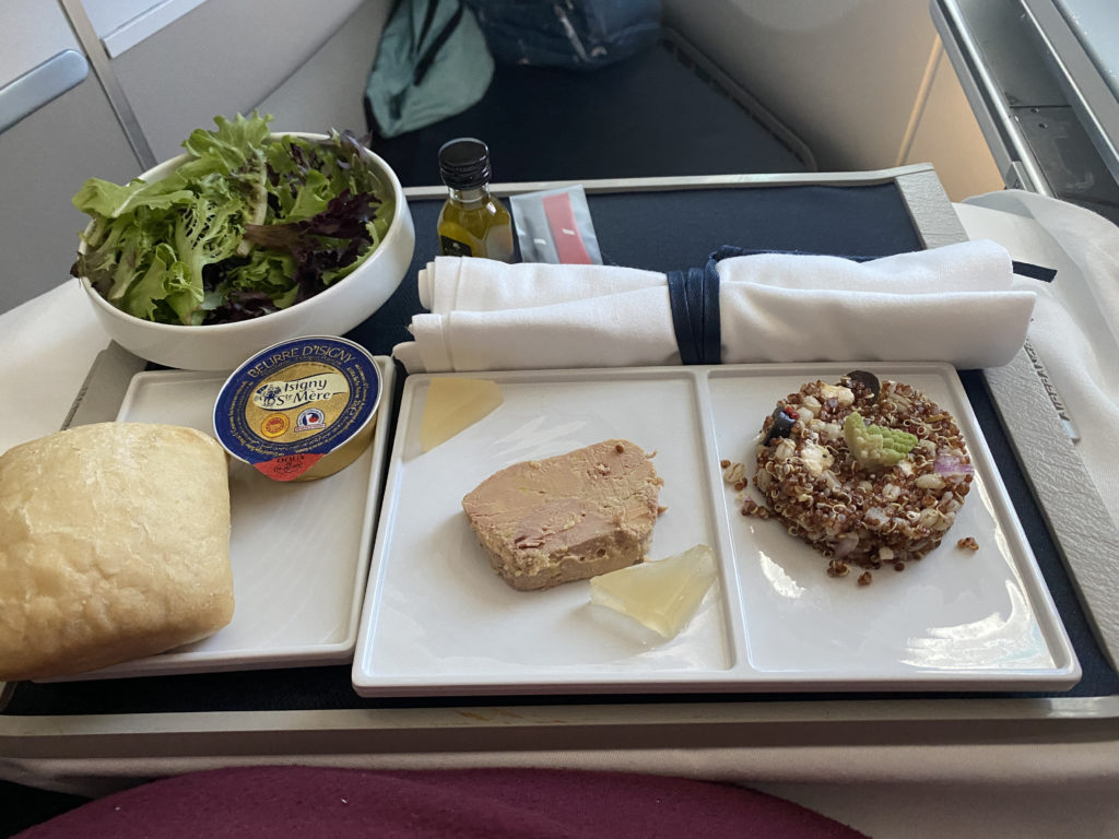 food on a tray on a plane