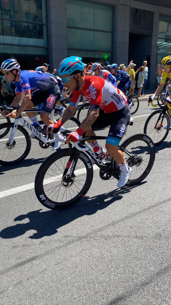 a group of people riding bicycles