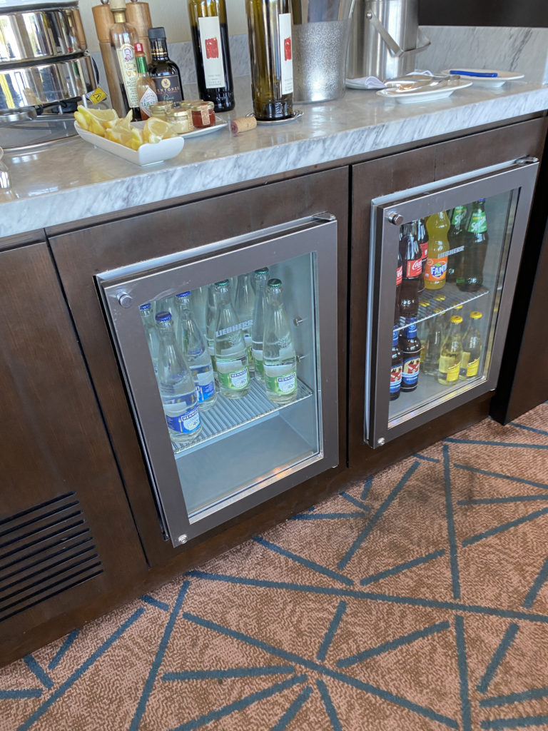 a refrigerator with drinks in it