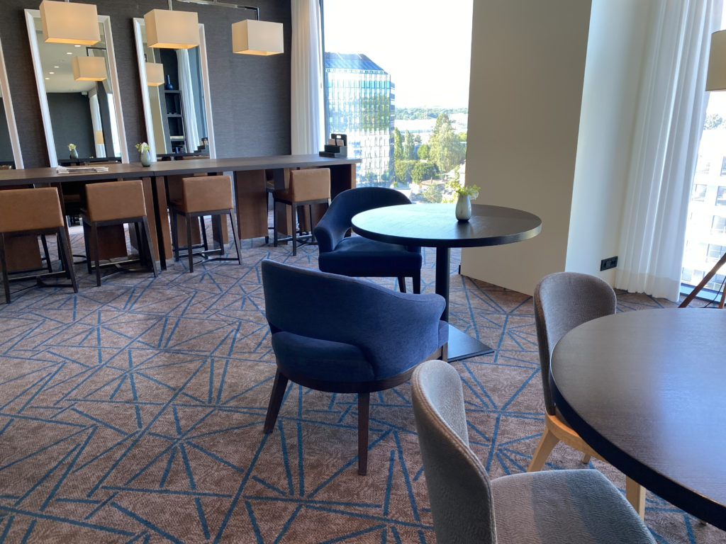 a room with chairs and tables